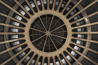 A sturdy, quickly assembled architectural hub shell standing resilient in rough terrain.