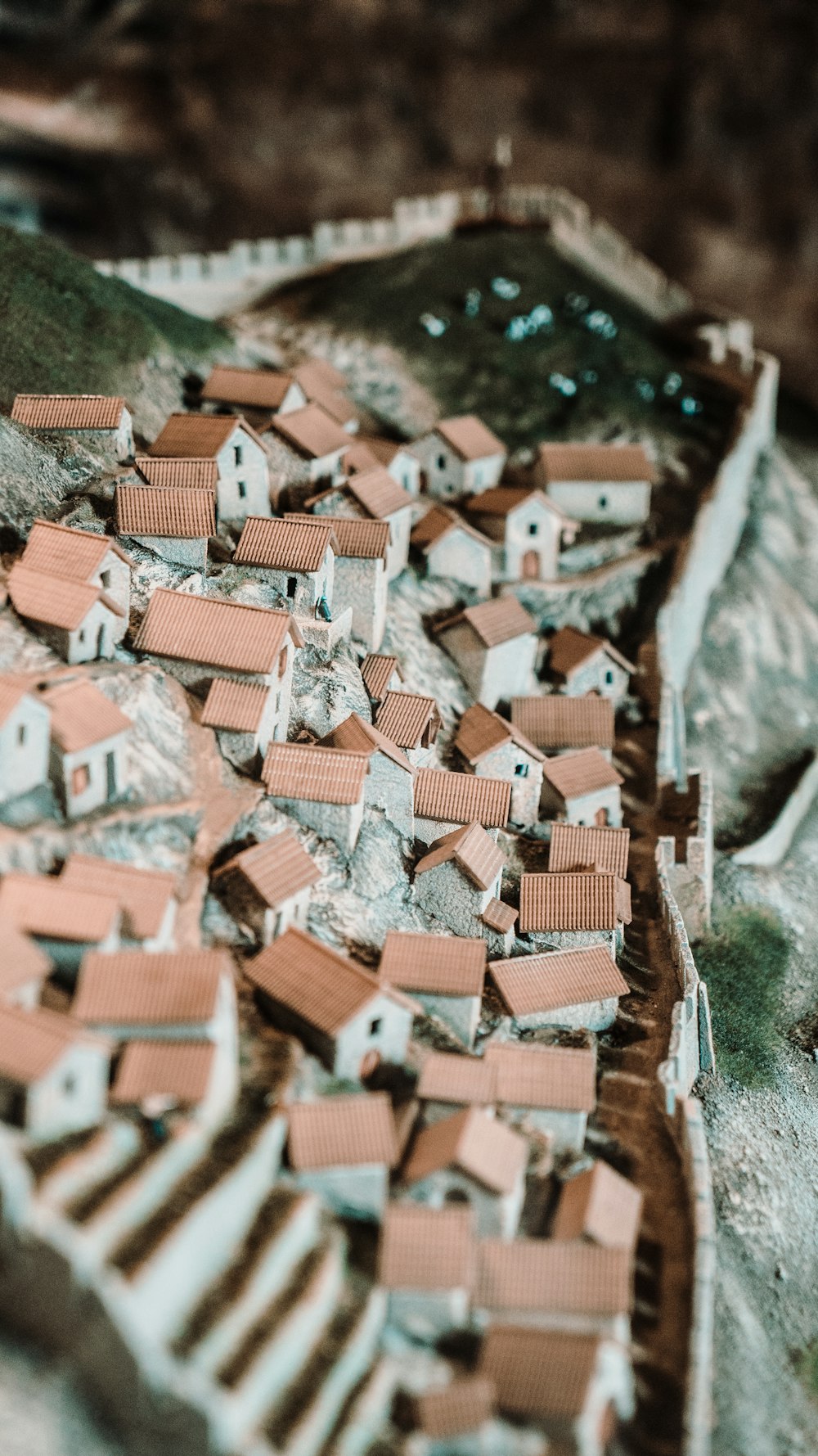 tilt shift photography of miniature house