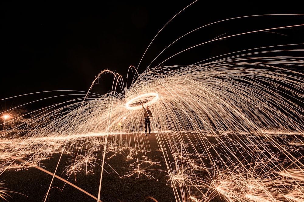 panning photography of fire dancers