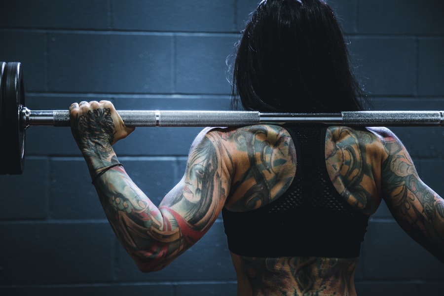 Athlete training with heavy barbell for strength