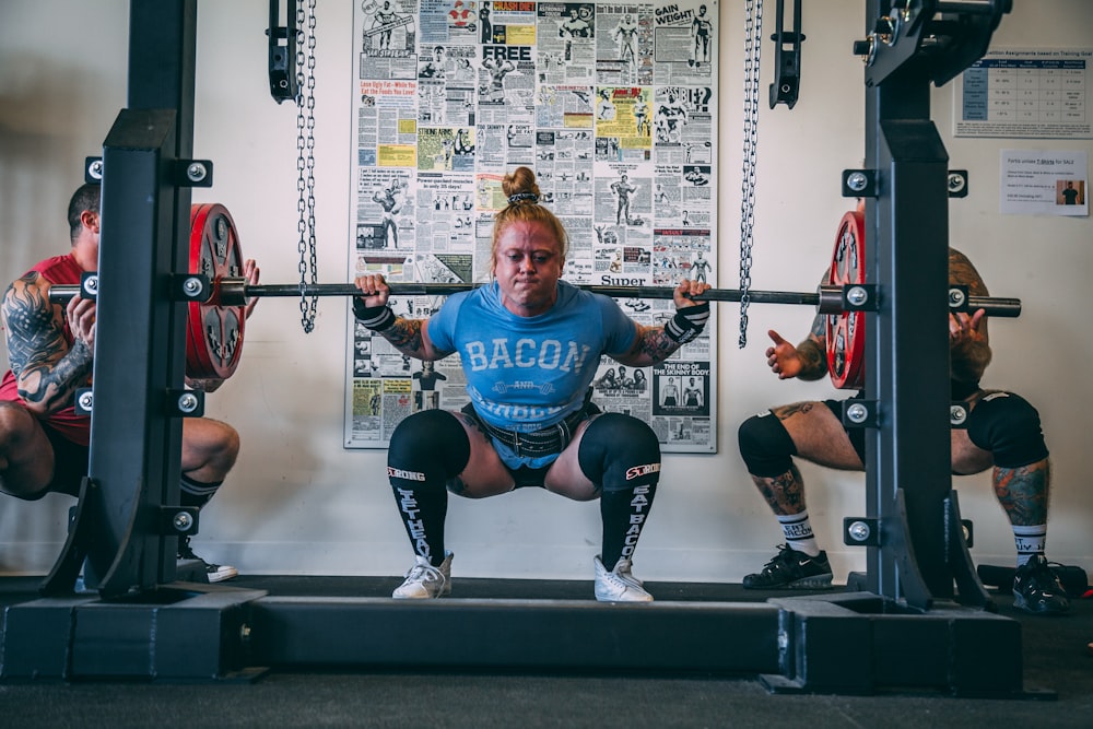 woman holding barbell