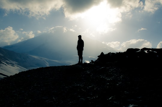 silhouette photo of man in Mount Elbrus Russia