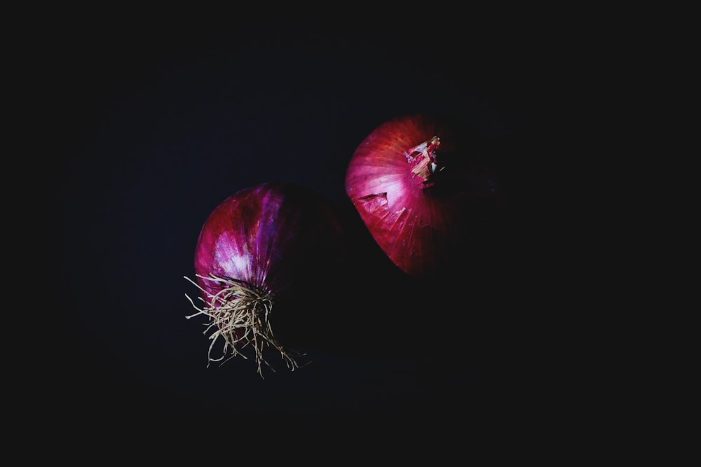 two red onion bulbs