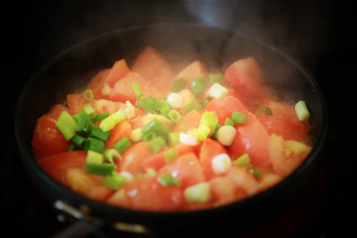 Pomodoro team capturing food styling with genuine laughter and focus.