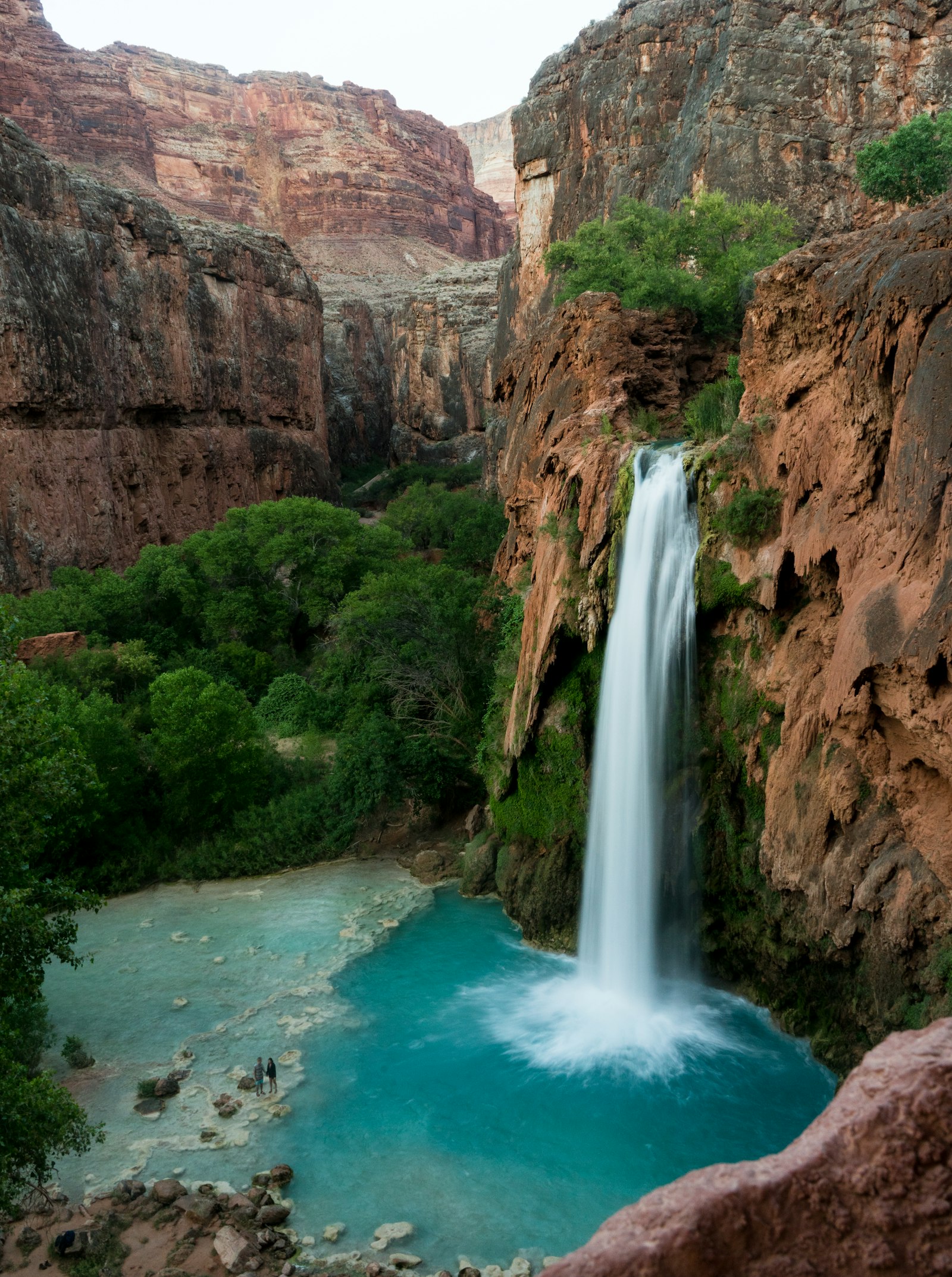 Sony FE 28-70mm F3.5-5.6 OSS sample photo. Waterfalls near green trees photography