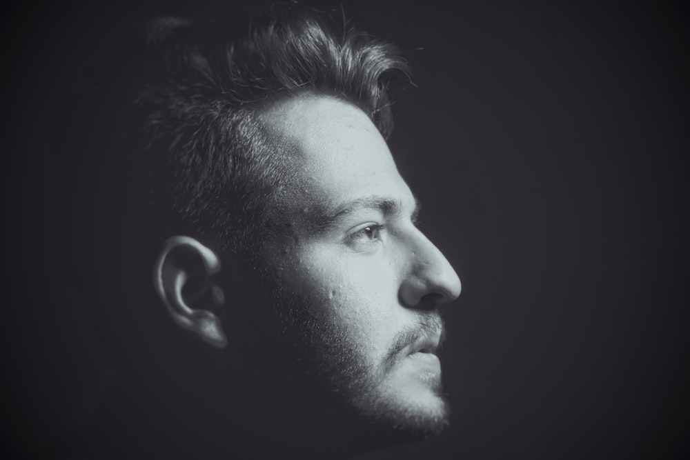 grayscale photography of man portrait photo
