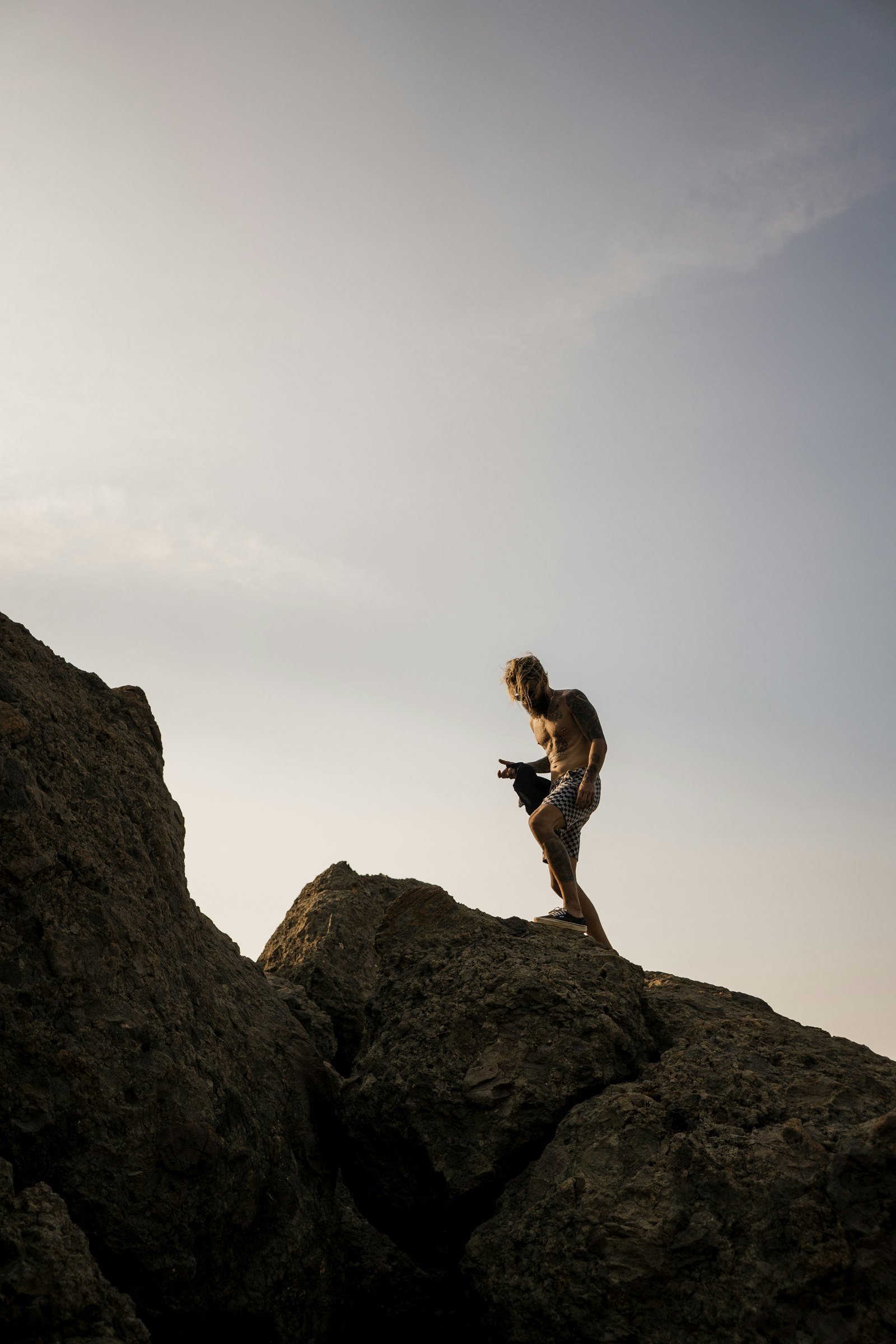 Sony E 20mm F2.8 sample photo. Man wearing white shorts photography