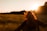 woman standing on grass field
