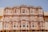 peach-colored mid-rise building low angle photography