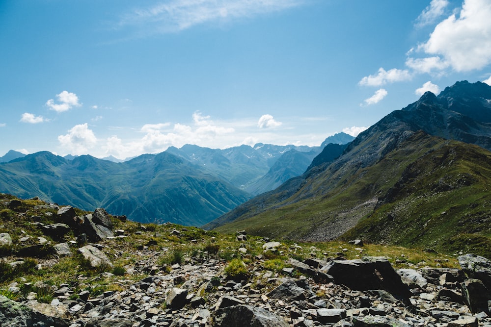 green and brown mountains under blue sky during daytime