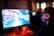 person using computer playing FPS game