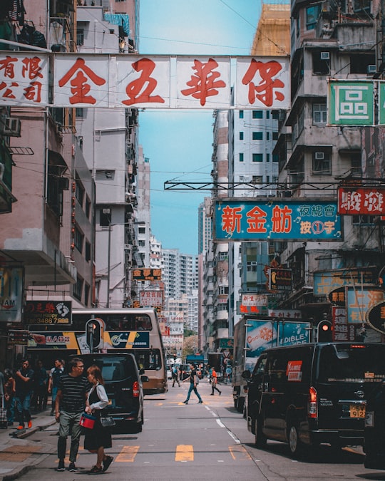 people walking in street during daty in Mong Kok Hong Kong