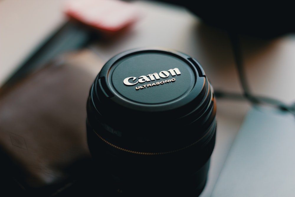 selective focus photo of Canon Ultrasonic zoom lens