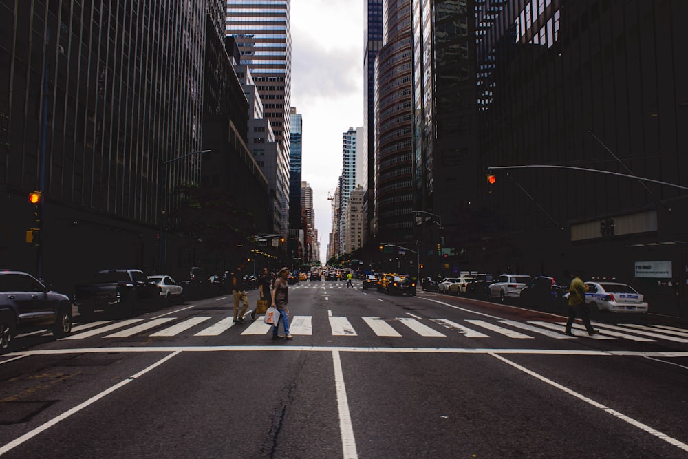 people walking on pedestrian lane