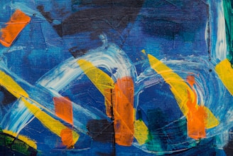 A vibrant abstract painting featuring bold colors and dynamic shapes.