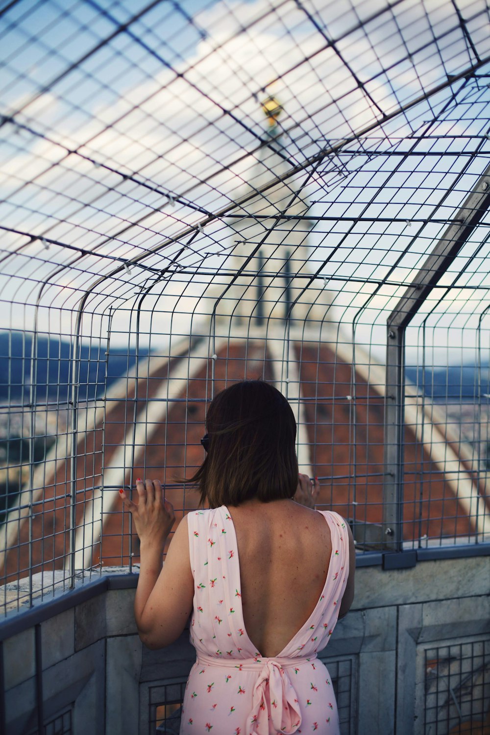 woman in cage on Florence, Italy