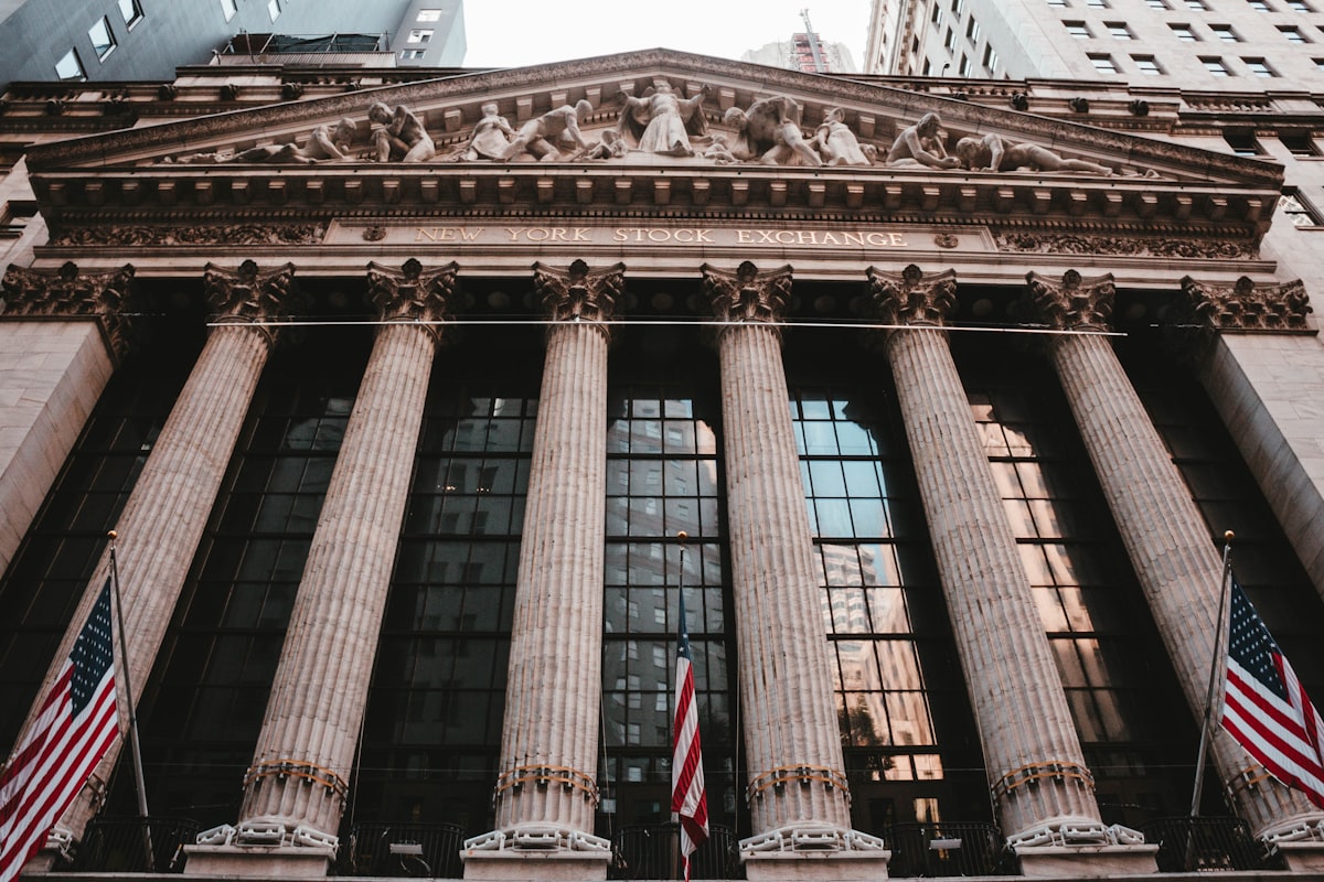 New York Stock Exchange building with American flags
