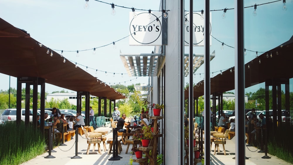 photo of person eating in Yeyo's store