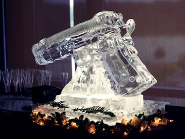 A beautifully arranged ice sculpture at an event.