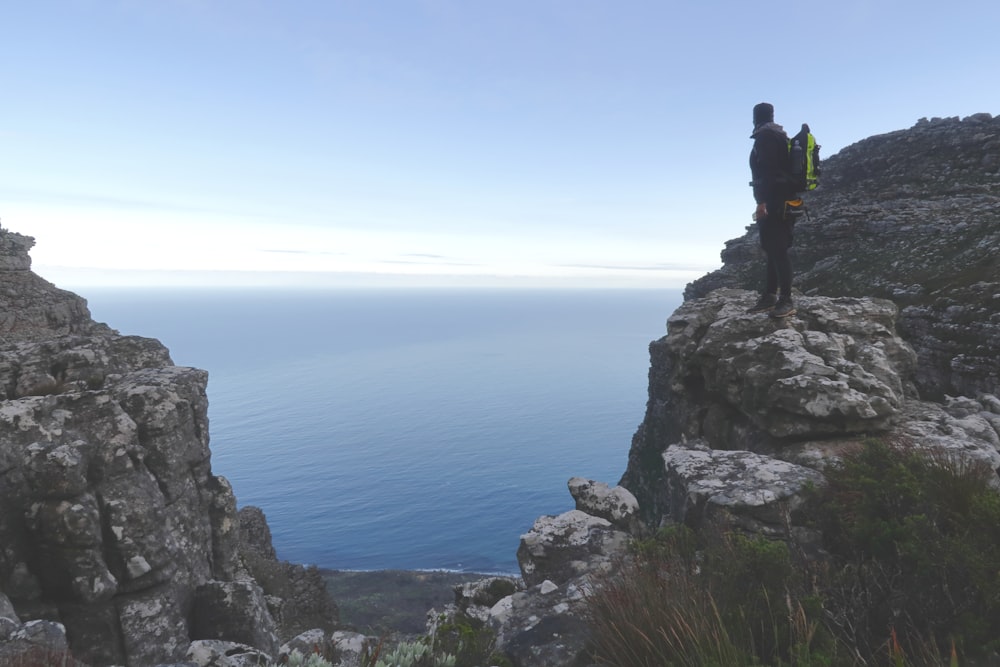 person standing near cliff