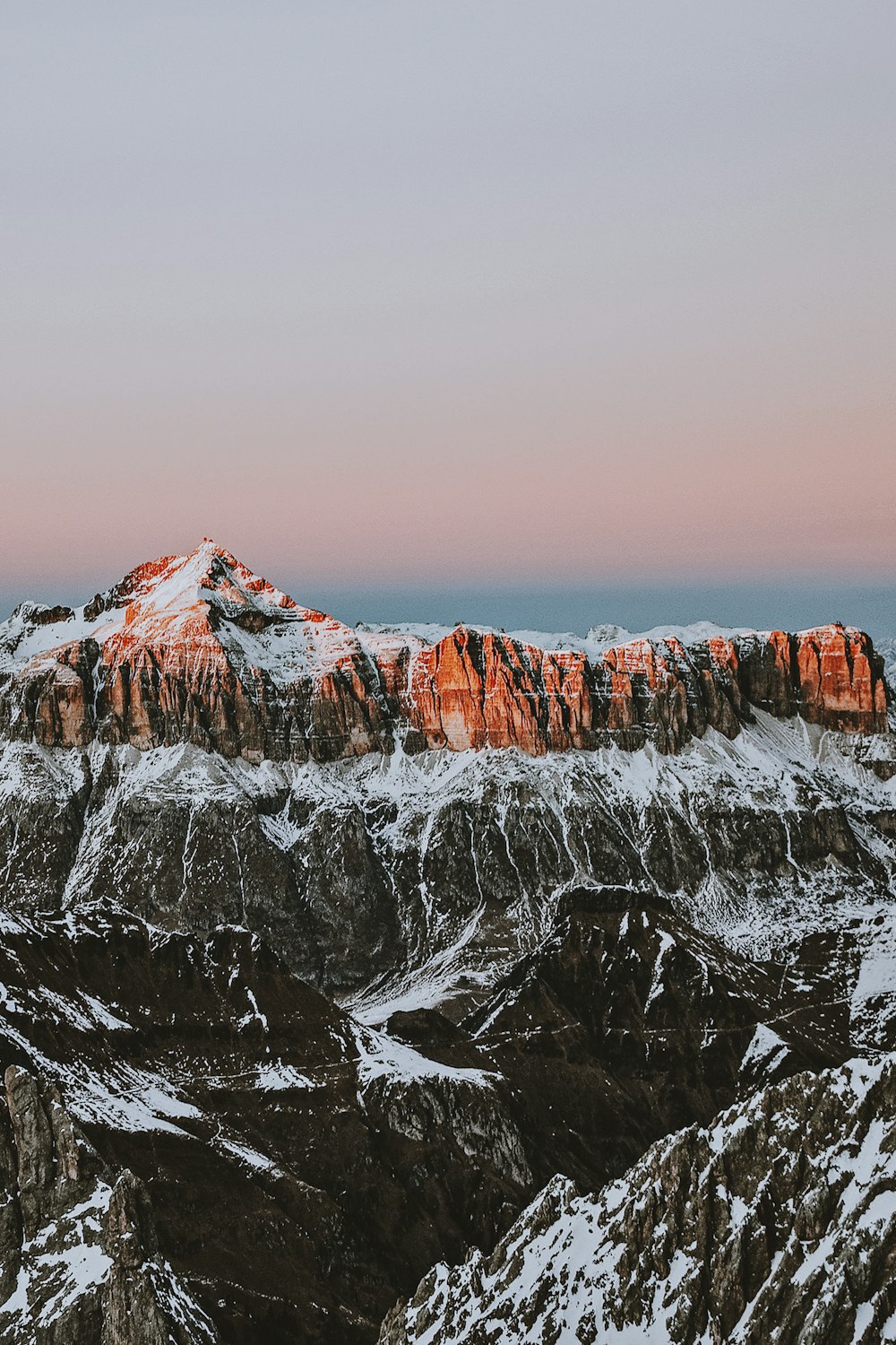 photography of mountains covered by snow at daytime