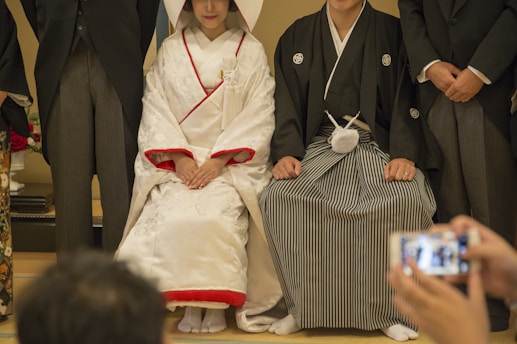 woman sitting beside man