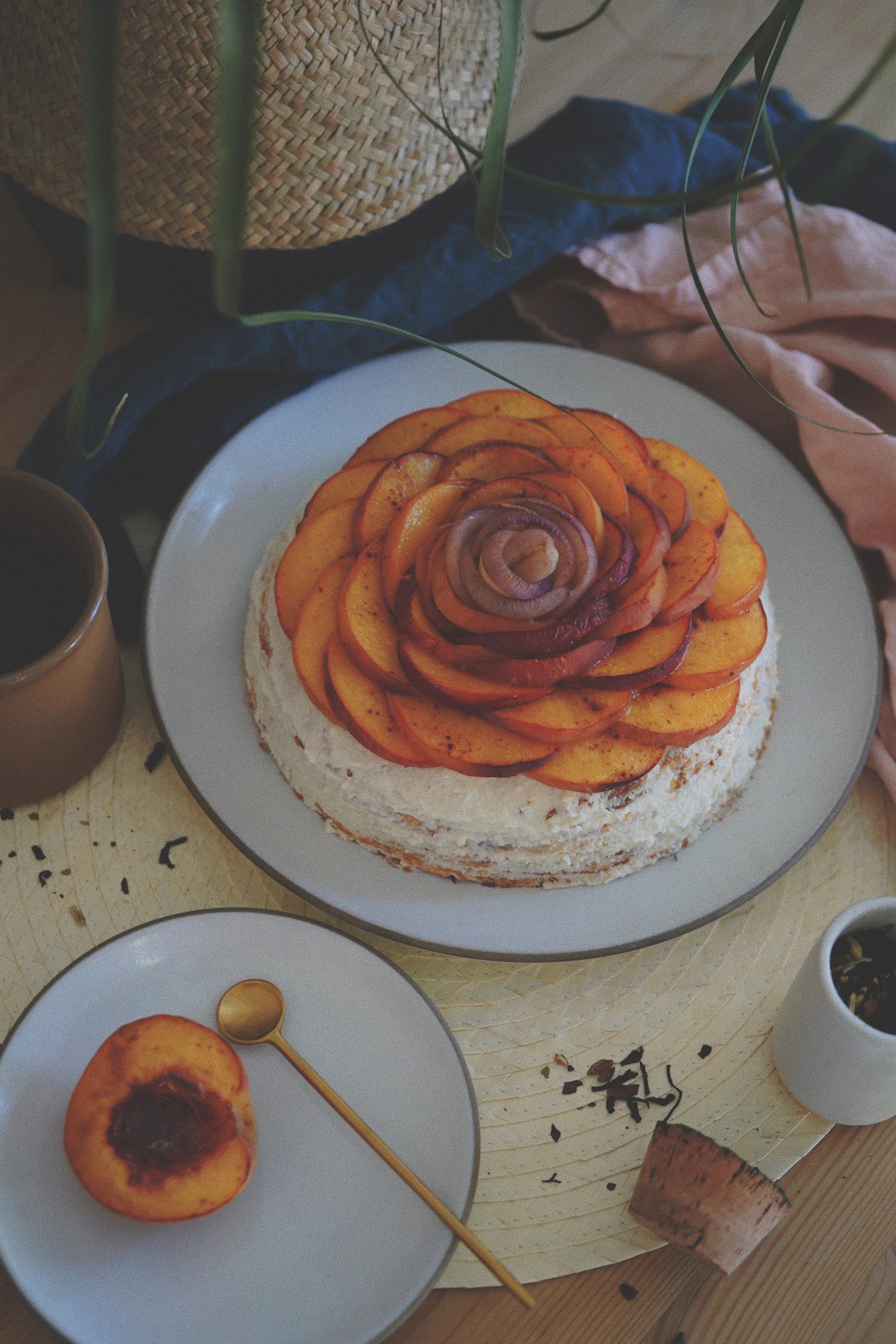 Slices of golden summer peach cake served on a white plate