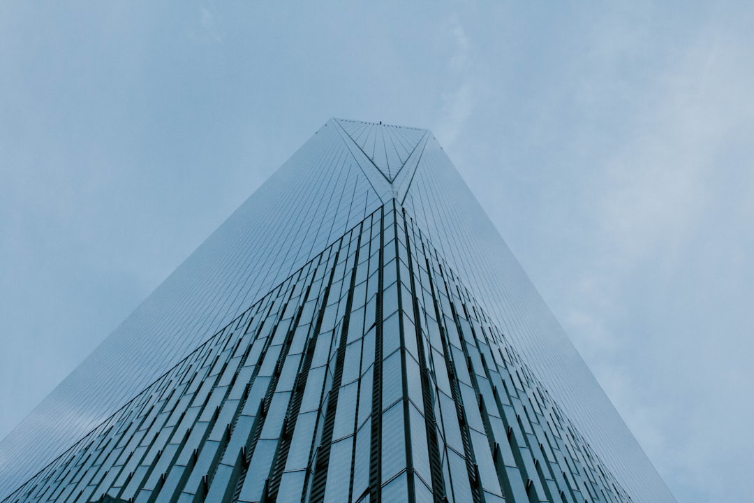 low-angle photography of curtain wall building