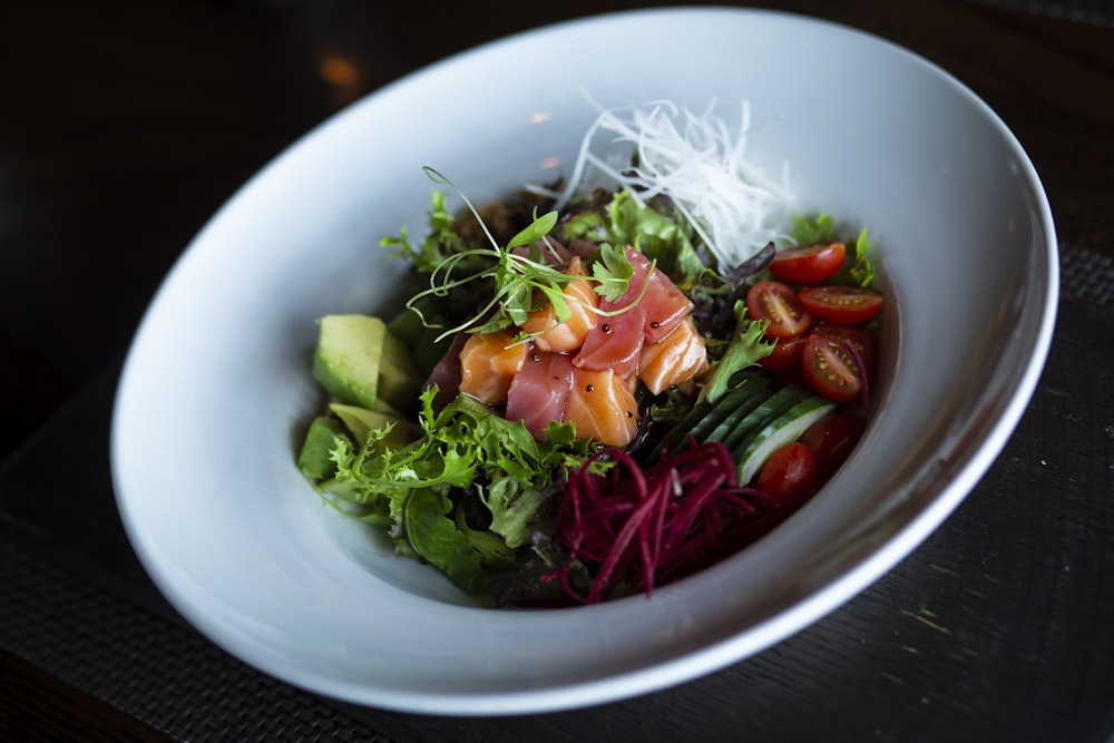 vegetable salad on round white plate