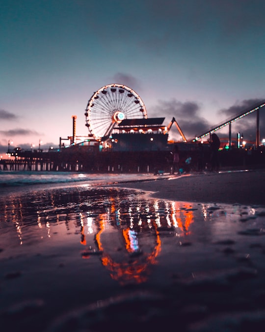 Ferris wheel during golden hour in Santa Monica Pier United States