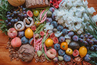 assorted fruit and seasoning on table