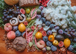 assorted fruit and seasoning on table