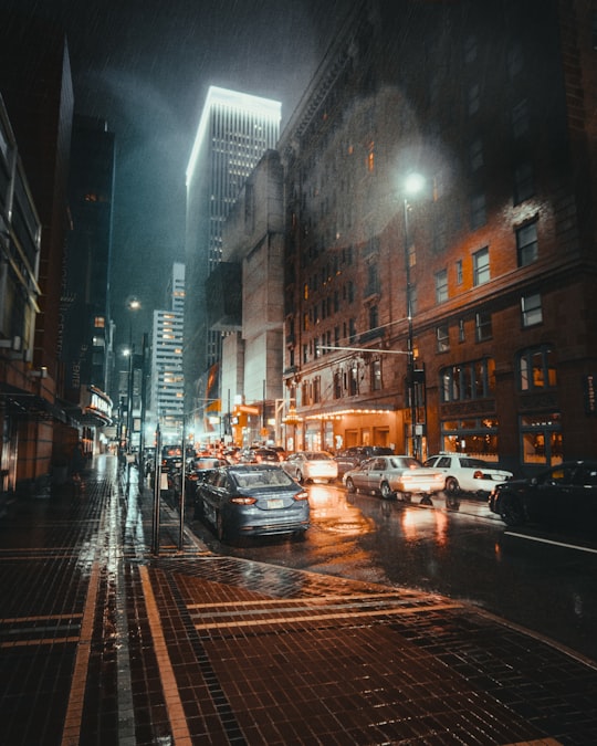 vehicles parked on road at night in Cincinnati United States