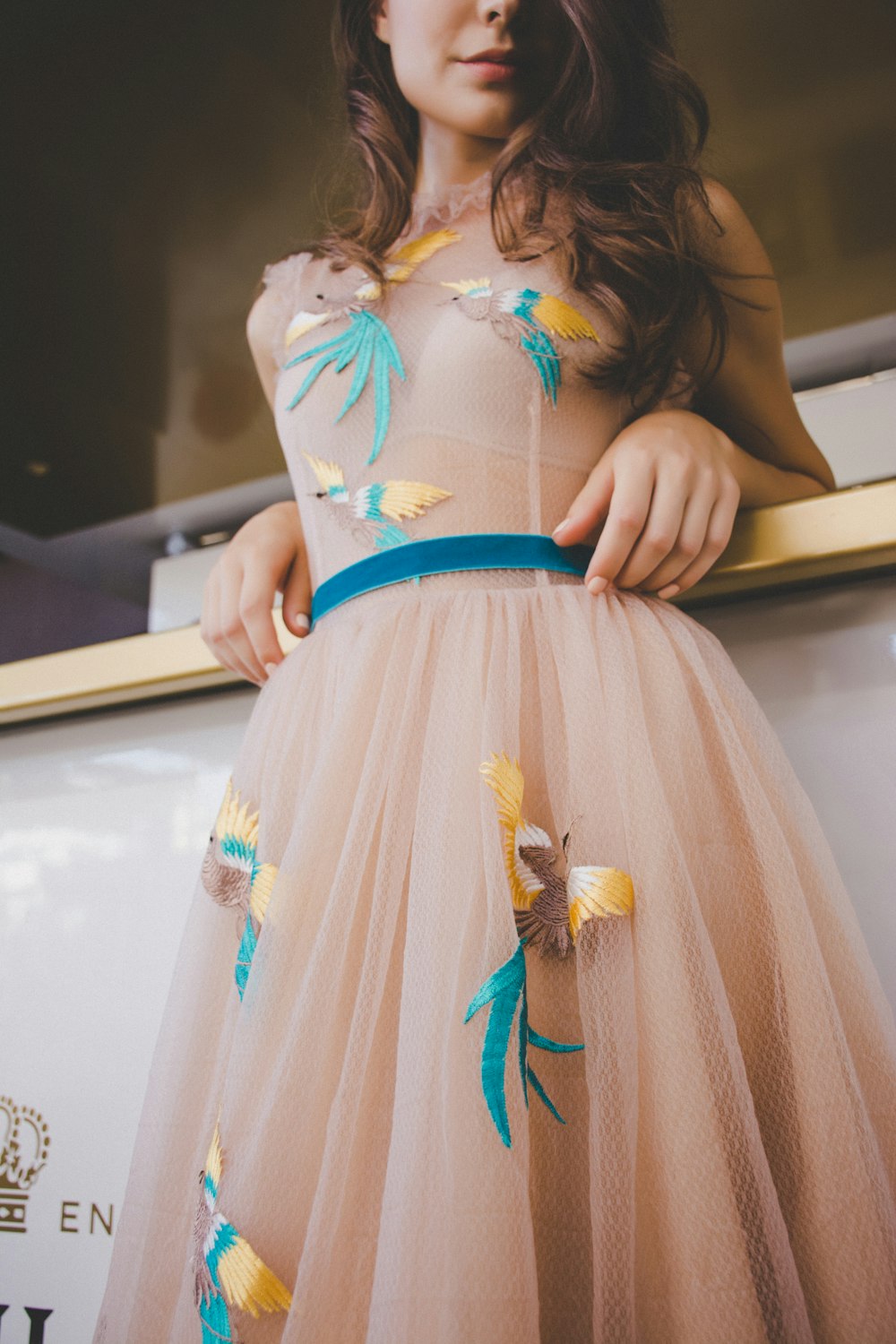 selective focus photography of woman leaning on table