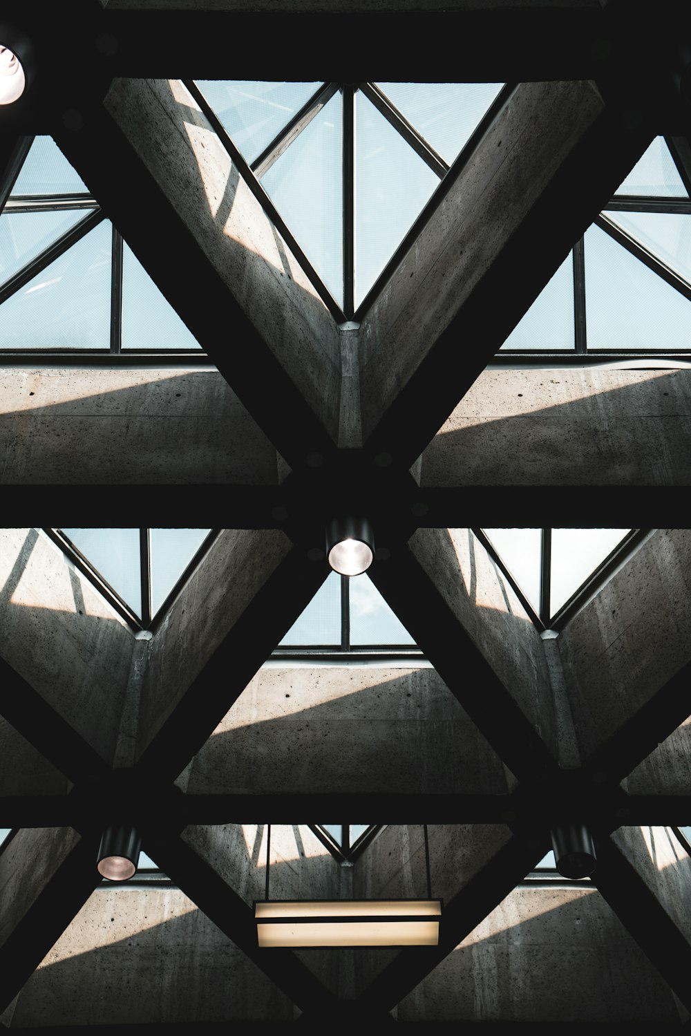 clear glass ceiling with gray concrete frames