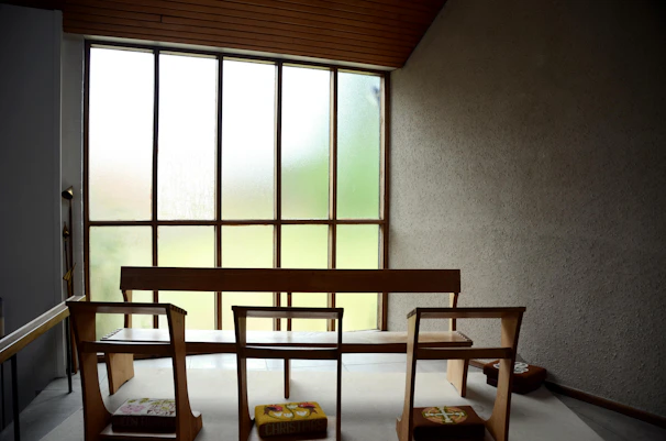 A serene study space with minimalist Chinese decor and soft natural light.