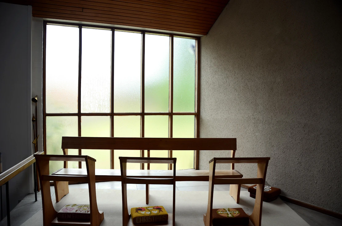 A serene Japanese minimalist office space with natural light and wooden accents.