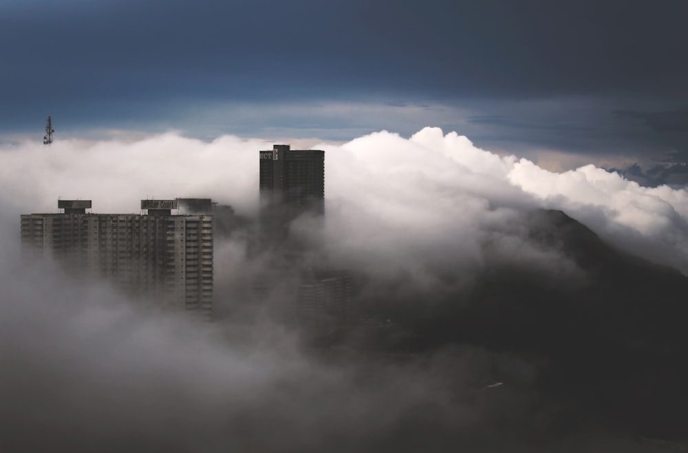 buildings covered by clouds