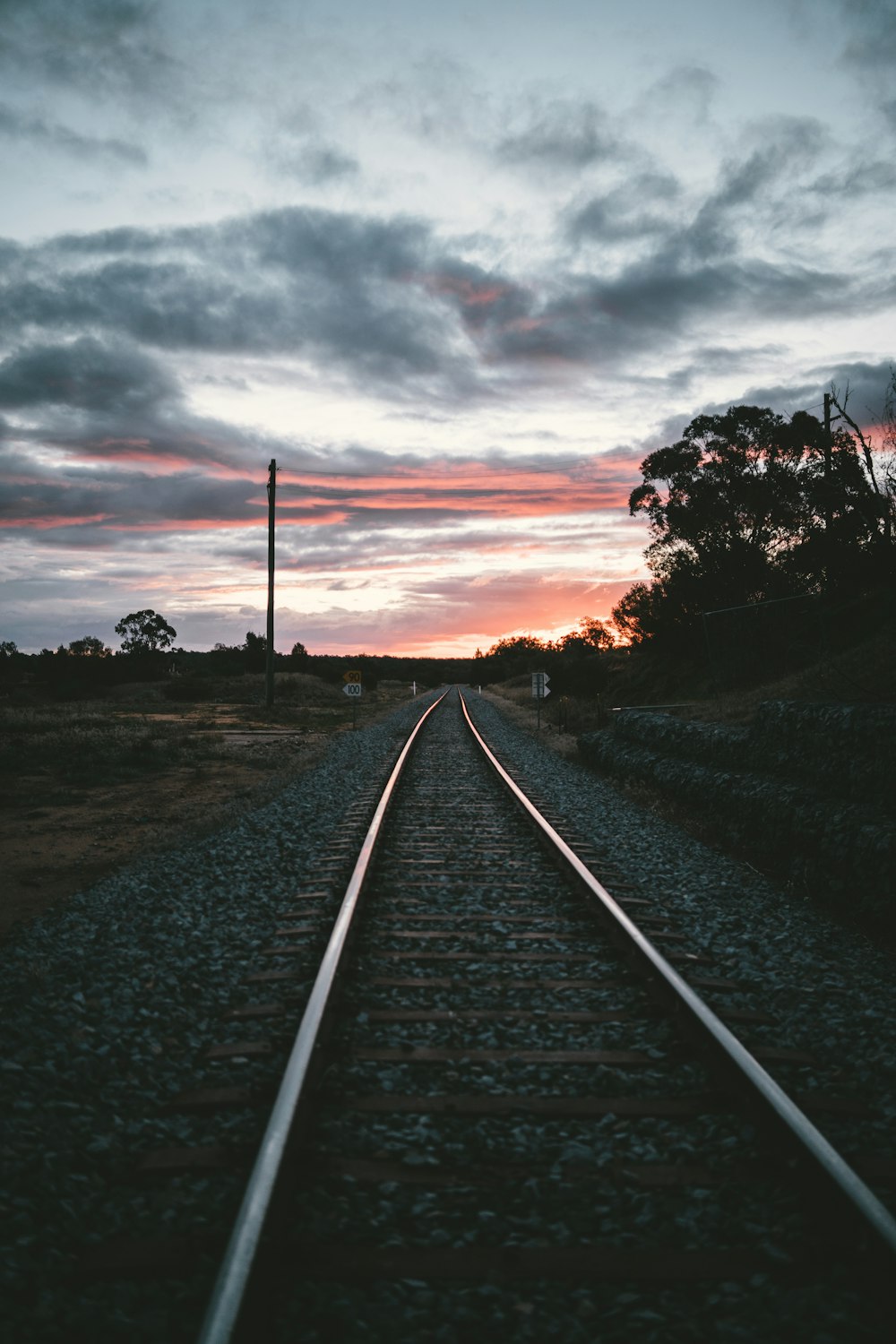 silhouette photo of train rails