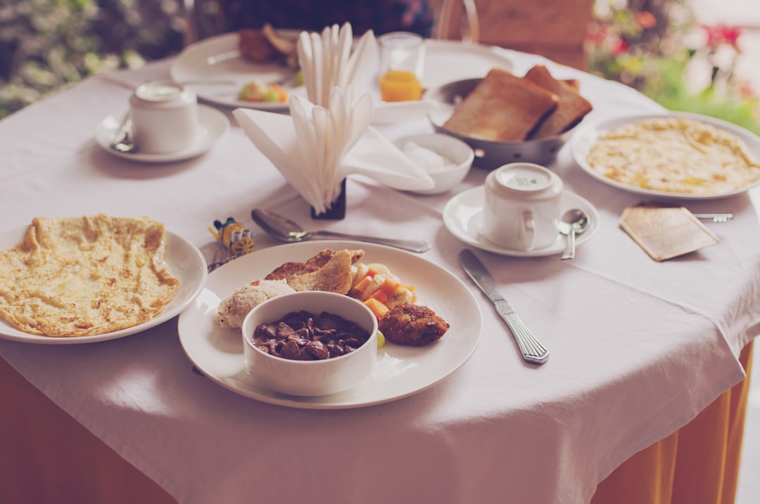 cooked food on white table, Breakfast layout in a restaurant cafe