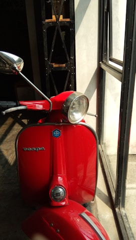 A vibrant retro Vespa wallpaper featuring classic design elements.