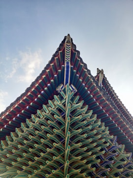 A completed roof structure with intricate details.