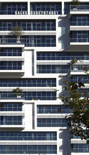 white concrete high-rise building