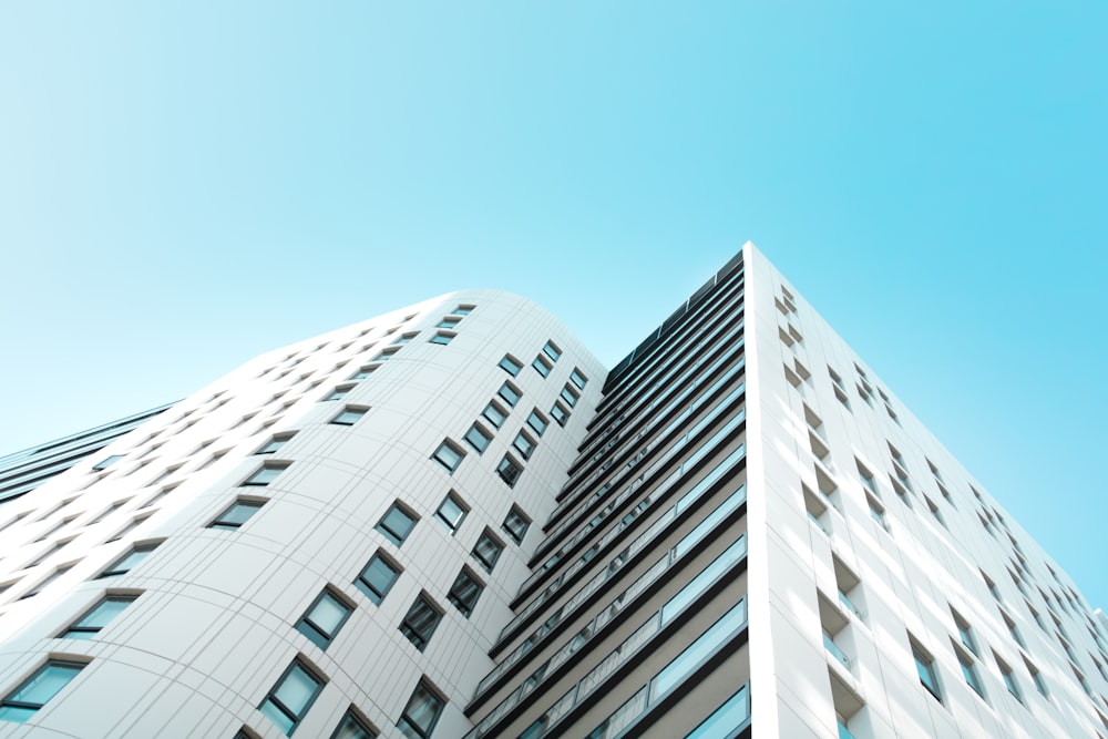 low angle photography of white concrete building