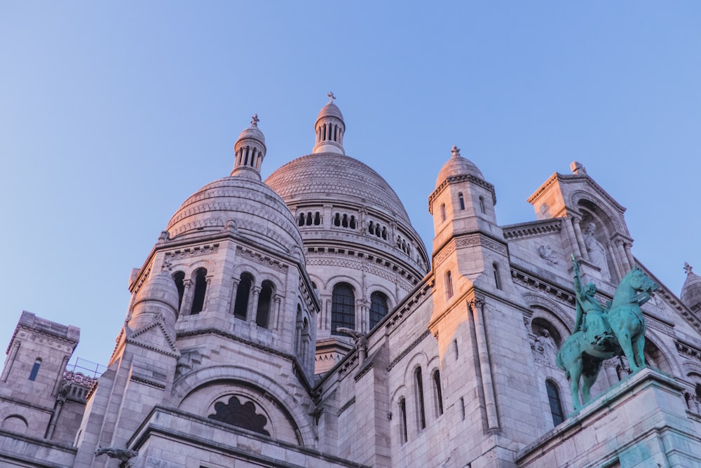 low-angle photography of grey dome building