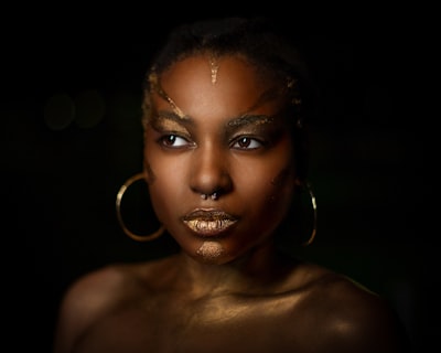 topless woman wearing hoop earrings radiant zoom background