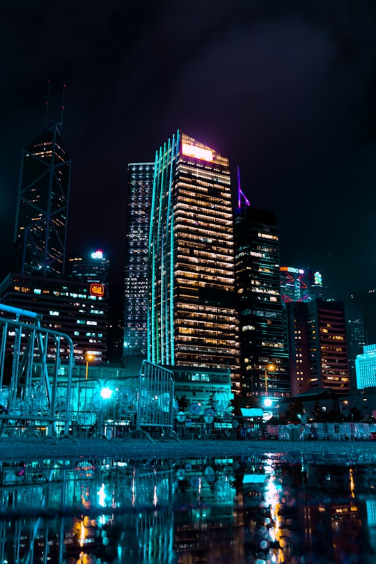 city skyline at night in Central and Western District Promenade – Central Section Hong Kong