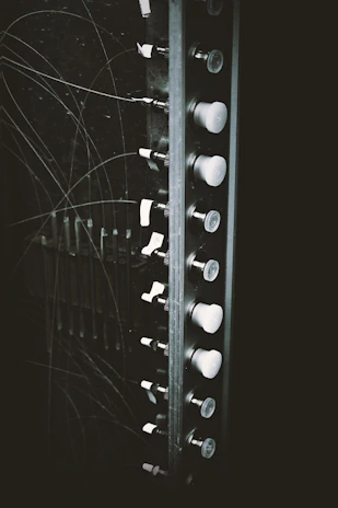 Before and after images showing a commercial panel board upgrade with clean wiring and industrial design.