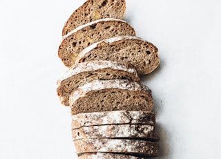 sliced breads on white surface