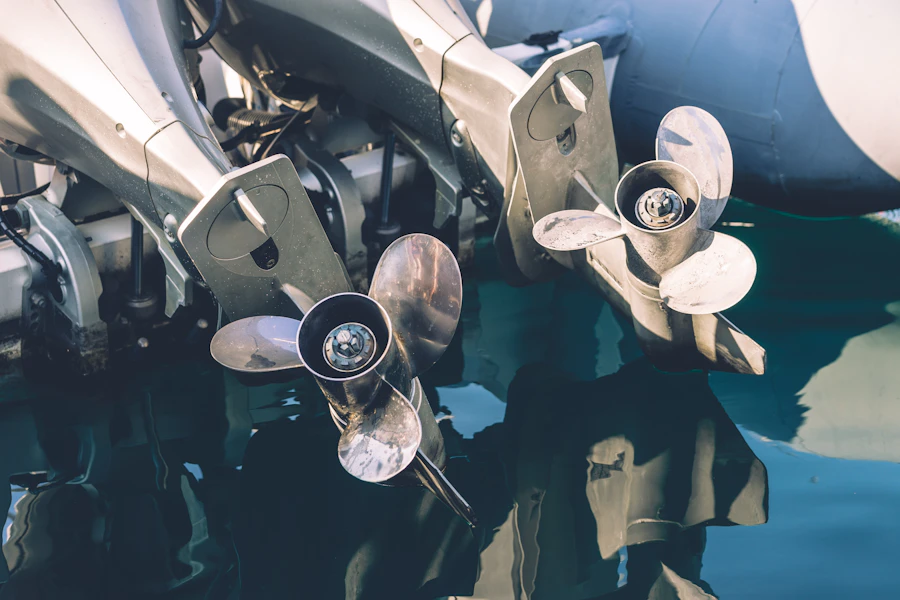 Large bronze marine propellers standing on a quayside